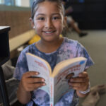 girl reading a book